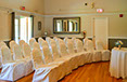 Semicircular chairs with all white coverings