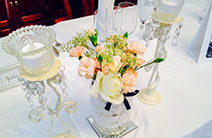Special wedding event table with crystal candle holders and flowers