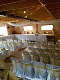 Decorated event with white chair coverings
